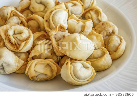 Manti is one favorite Turkish traditional dishes. Manti is very popular and common with or without yogurt in Turkey. 98558606