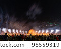 Crowd watching fireworks and celebrating new year eve 98559319