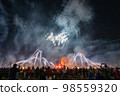 Crowd watching fireworks and celebrating new year eve 98559320