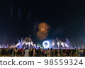 Crowd watching fireworks and celebrating new year eve 98559324