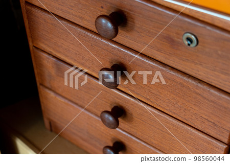 wooden drawers of old furniture 98560044