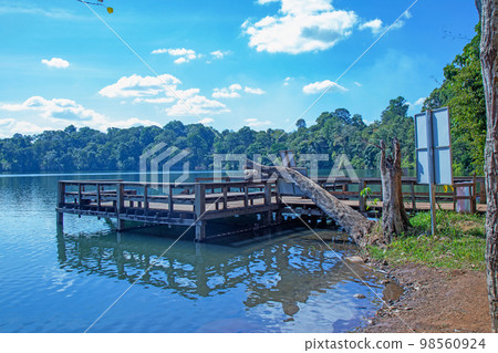 Yakloum Lake wooden stage at Ratanakiri daytime Yakloum Lake wooden stage at Ratanakiri daytime 98560924