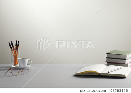 various office supplies on the desk 98563136