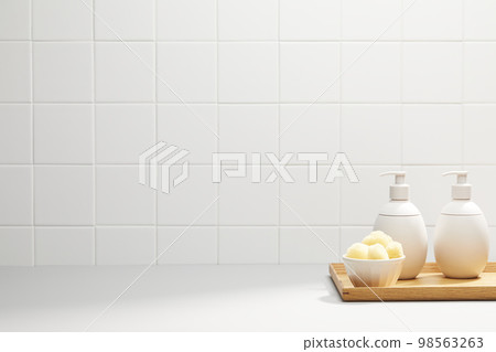 Various bathroom accessories on a tiled background Various bathroom accessories on a tiled background 98563263