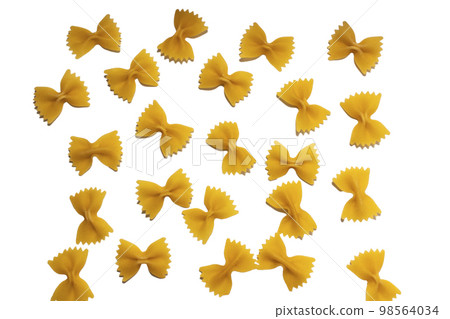 Dry raw uncooked farfalle pasta background. Flat lay 98564034