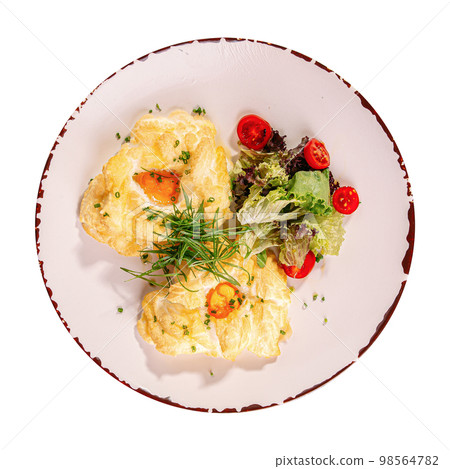 Breakfast cloud egg nests whipped whites with salad Breakfast cloud egg nests whipped whites with salad 98564782