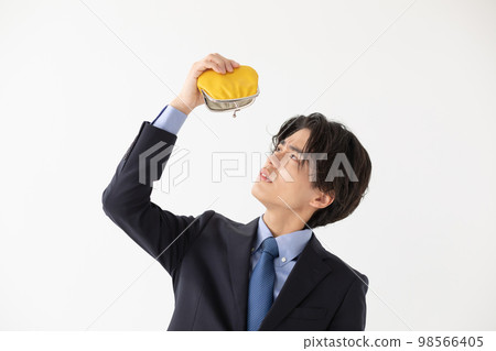 Businessman running out of money wallet clasp Businessman running out of money wallet clasp 98566405