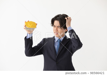 Businessman running out of money wallet clasp Businessman running out of money wallet clasp 98566421
