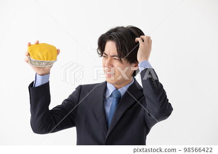 Businessman running out of money wallet clasp Businessman running out of money wallet clasp 98566422