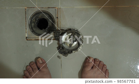 Drain cleaning. Clogged and dirty sewer pipes floor drain. Full of hair and accumulated clogged grease. Maintenance the floor drain sewage system in bathroom. fixing clean wash and unclog a drain. Drain cleaning. Clogged and dirty sewer pipes floor drain. Full of hair and accumulated clogged grease. Maintenance the floor drain sewage system in bathroom. fixing clean wash and unclog a drain. 98567781