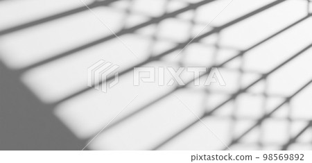 blur background. Abstract shadow of the window in morning light on white wall texture 98569892