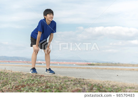 Junior high school boy warming up 98570483