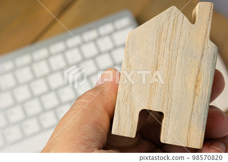 The wood home for building or property concept. The wood home for building or property concept. 98570820