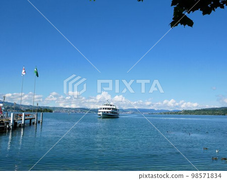Pleasure boat on Lake Zurich entering the port of Rapperswil (St.Gallen, Switzerland) Pleasure boat on Lake Zurich entering the port of Rapperswil (St.Gallen, Switzerland) 98571834