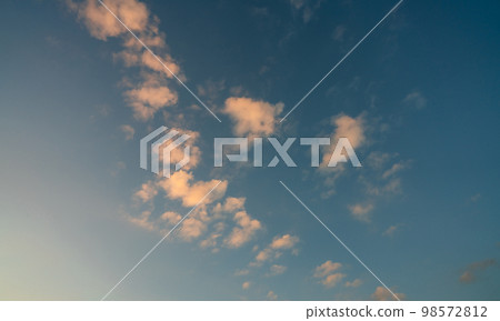 Beautiful blue sky and white clouds abstract background. Cloudscape background. Blue sky and white clouds with morning sunlight. Beautiful blue sky. World Ozone Day. Ozone layer. Summer sunrise sky. 98572812