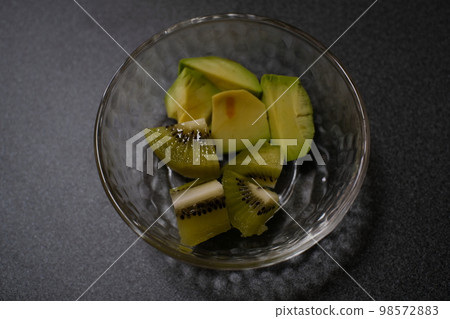 cut kiwi and cut avocado 98572883