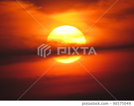 a sun at the sunset time, close up the sun a sun at the sunset time, close up the sun 98575049