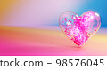 Magic of heart particles inside the glass heart jar and splashing particles 98576045