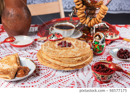 Pancakes with berries and sour cream Pancakes with berries and sour cream 98577175
