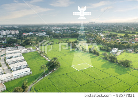 Land, house, residential area and satellite in aerial view. Land, house, residential area and satellite in aerial view. 98577821