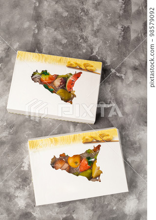 Carton boxes with traditional Sicilian colorful marzipan fruits 98579092