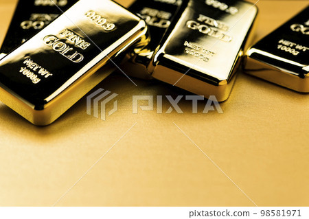 image photo of gold nuggets on a golden background 98581971