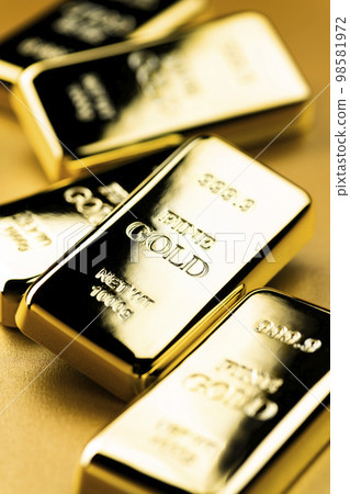 image photo of gold nuggets on a golden background 98581972