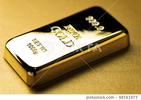 image photo of gold nuggets on a golden background image photo of gold nuggets on a golden background 98581973