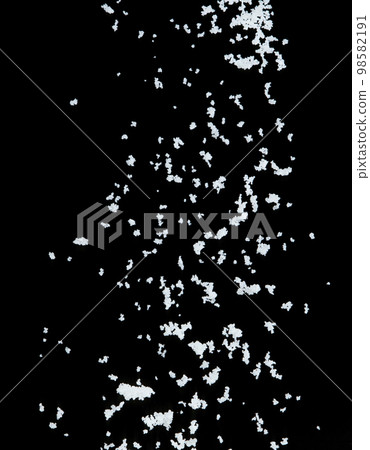 Salt flying explosion, crystal white grain salts explode abstract cloud fly. Beautiful complete seed salt splash in air, food object design. Selective focus freeze shot black background isolated 98582191