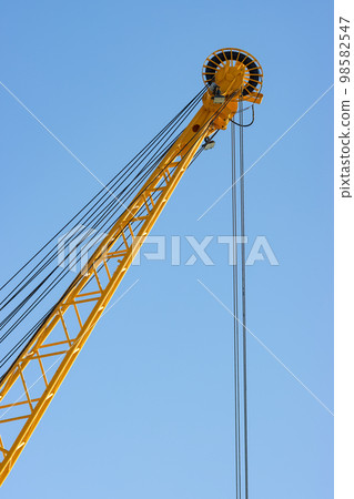 The coil of the yellow lifting crane 98582547