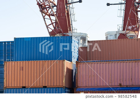 A bunch of cargo containers in the open air 98582548