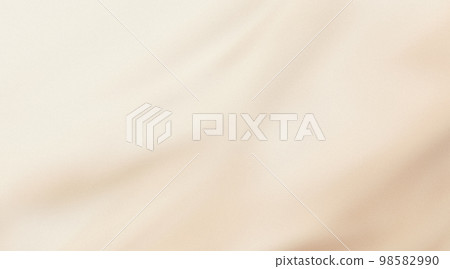 Light beige grainy gradient background, vanilla toned blurry cosmetics background, silk drapery backdrop 98582990