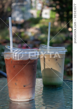 Iced coffee with nature background 98583877