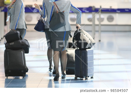 Flight attendant heading to the boarding gate International flight 98584507