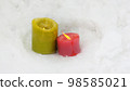 snow and candles 98585021