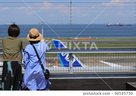 A woman looking at the runway, Haneda Airport Observation Deck 98585730