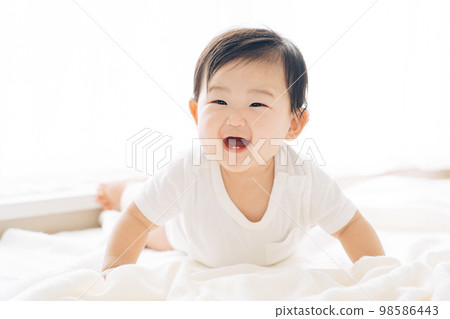 Smiling baby 98586443