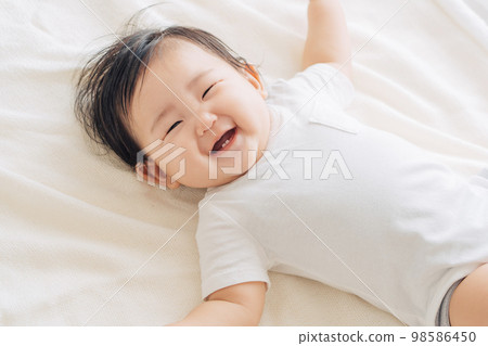 Smiling baby Smiling baby 98586450