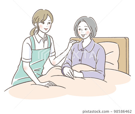 Caregiver woman smiling at senior woman in bed Caregiver woman smiling at senior woman in bed 98586462