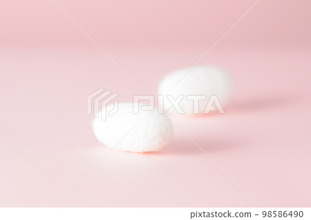 White cocoon ball (2) background pink White cocoon ball (2) background pink 98586490
