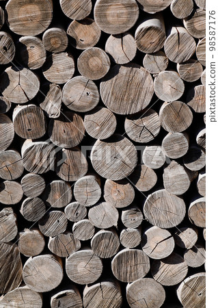 Stacked firewood 98587176