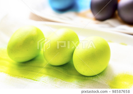 Painted eggs on the table after painting, a symbol of Easter, eggs  98587658