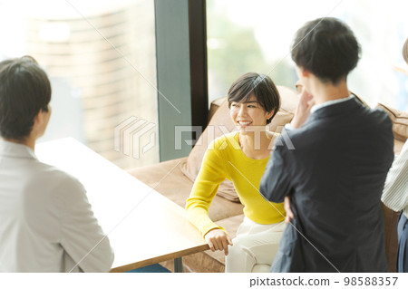 people working in office building 98588357