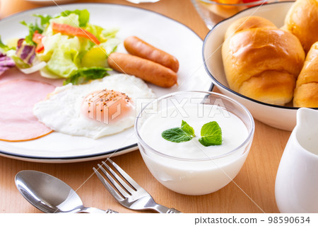 eat yogurt for breakfast 98590634