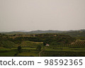 Landscape with the military bunkers in the middle of a rural fields, Apollonia, Fier, Albania 98592365