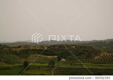 Landscape with the military bunkers in the middle of a rural fields, Apollonia, Fier, Albania 98592365