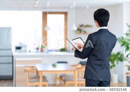 Real estate male consultant new employee finance insurance living room businessman sales 98592546