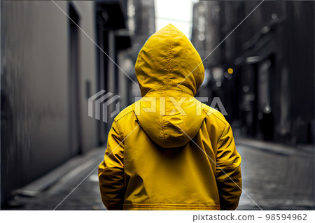 Kid in yellow jacket, view form behind, copy space Kid in yellow jacket, view form behind, copy space 98594962