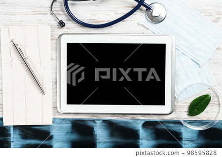 Flat lay workplace of doctor in modern clinic 98595828
