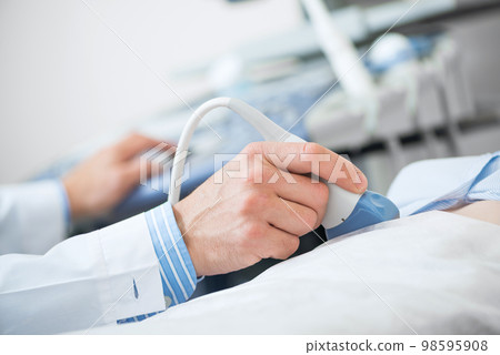 Sonogram procedure at modern hospital 98595908